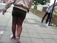 Black Girl Legs In Tight Shorts.